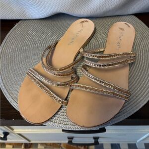 Mariella light tan flat sandals with amber and clear rhinestones. Size 10